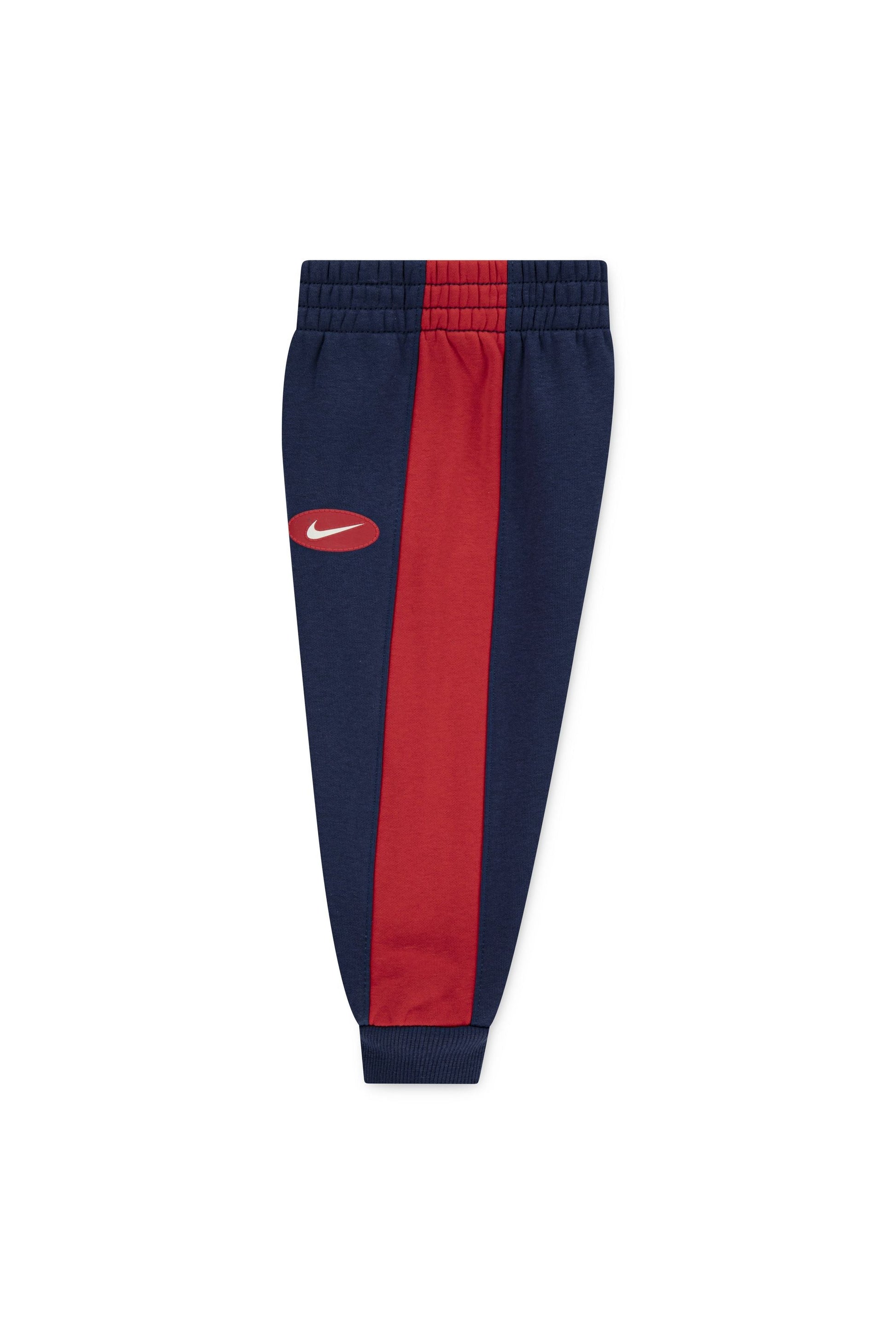 חליפת טרנינג NIKE עם פסי צד שחורים ולוגו קדמי לילדים BLUE / 2Y