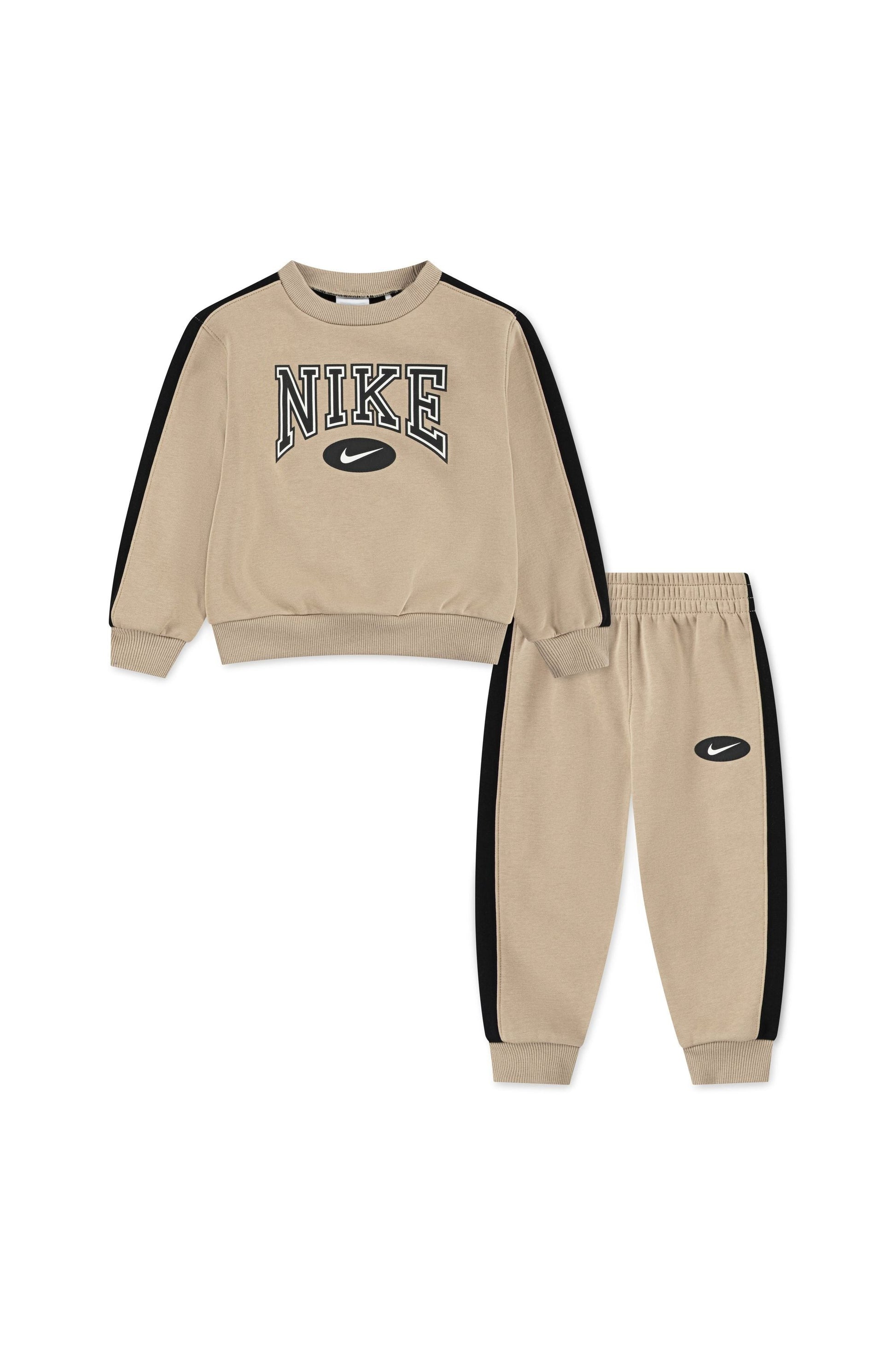 חליפת טרנינג NIKE עם פסי צד שחורים ולוגו קדמי לילדים BEIGE / 2Y