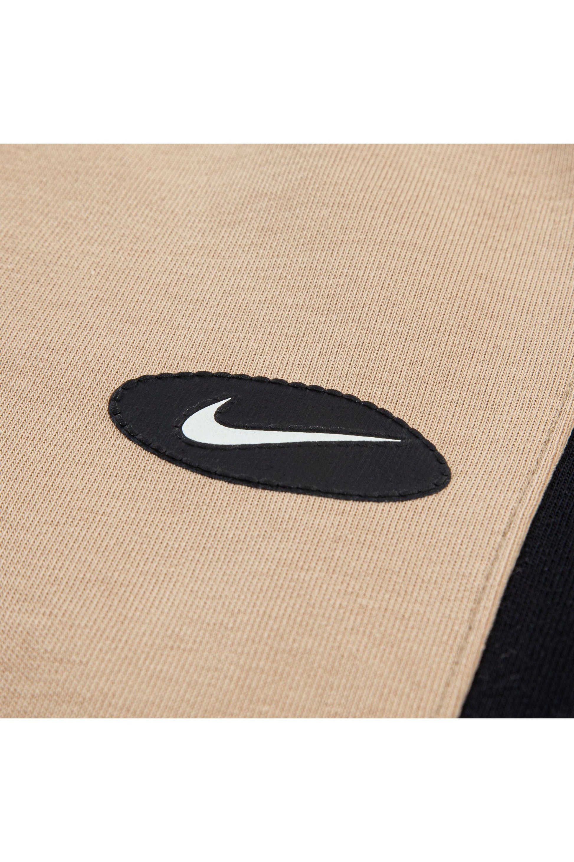 חליפת טרנינג NIKE עם פסי צד שחורים ולוגו קדמי לילדים BEIGE / 2Y