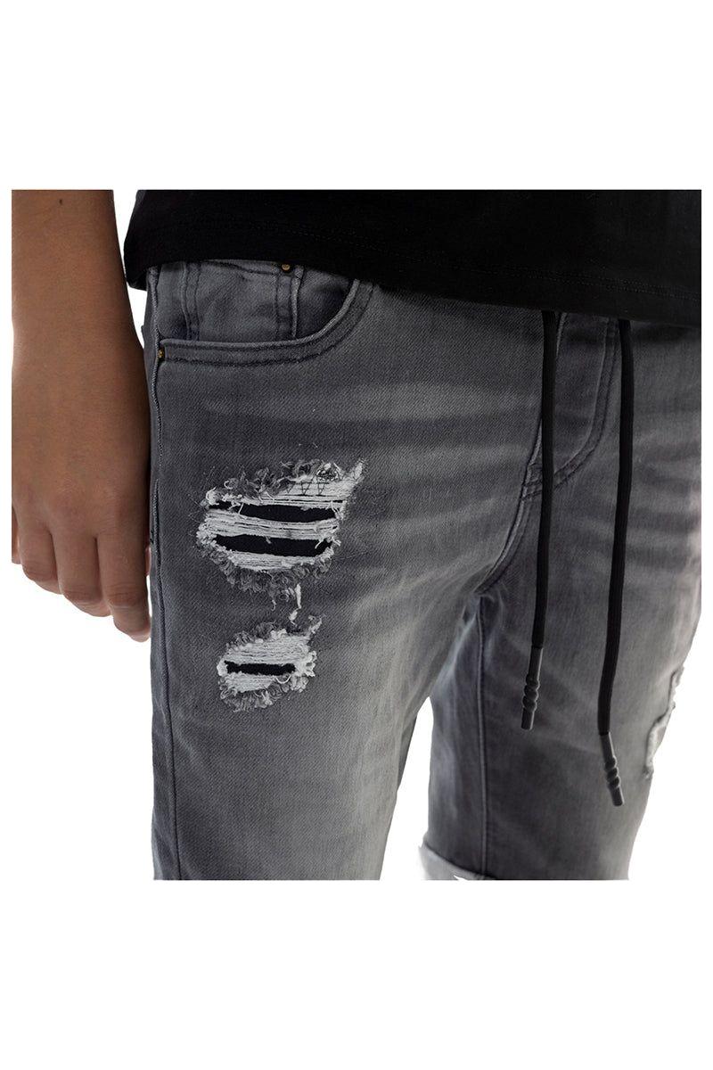 מכנסי ג'ינס קצר משופשפים עם קרעים ושרוכים ORO בנים